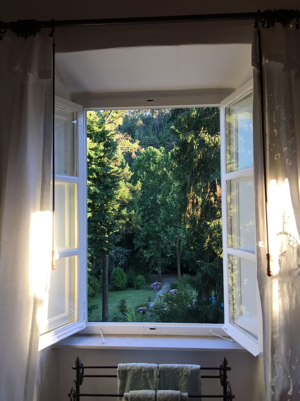 Filtering light from setting sun, in southwest bedroom
