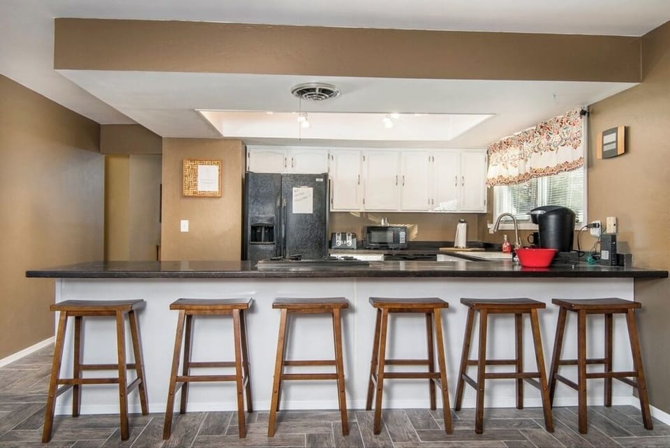Lots of room to hang out and chat at the kitchen bar