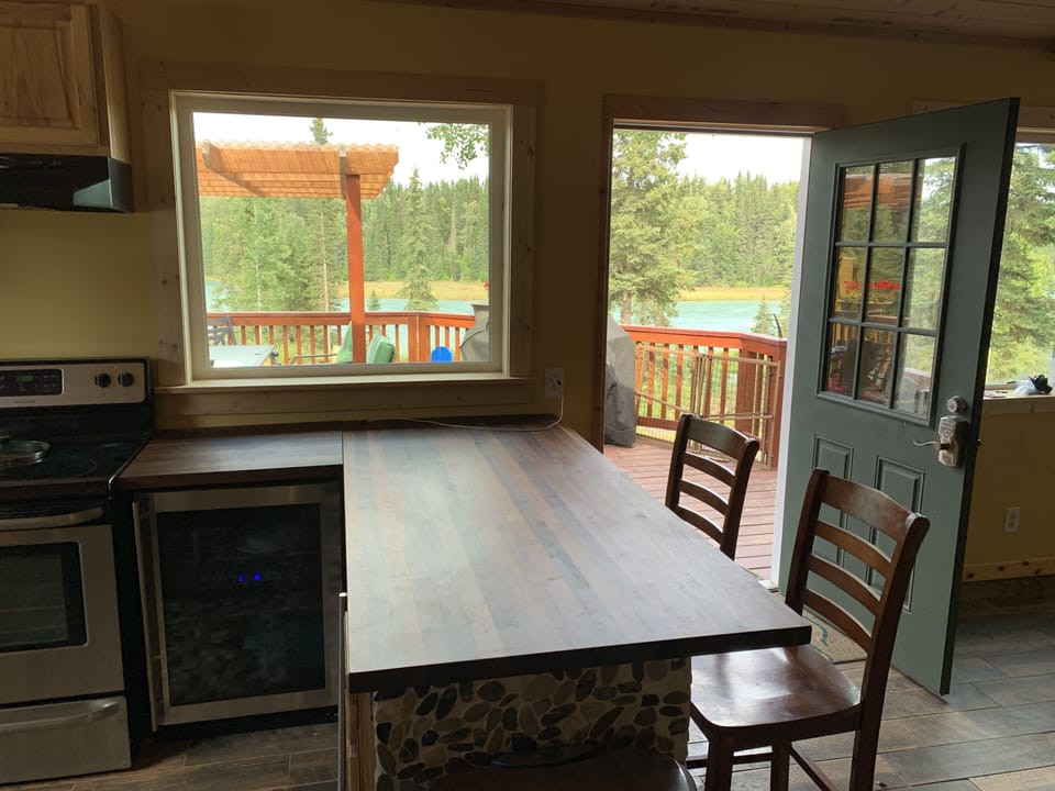 Kitchen view, plus small fridge.  Larger fridge in mudroom.