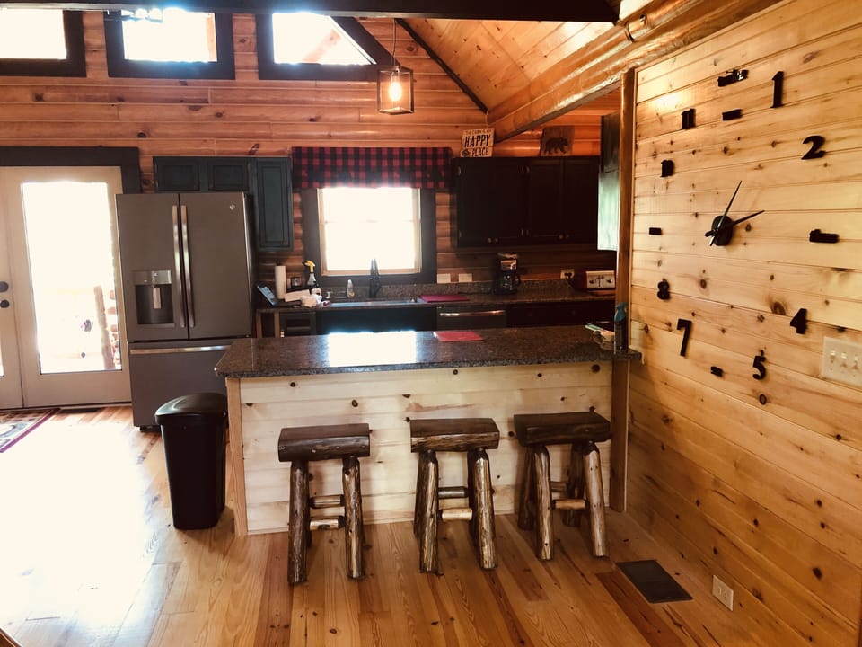Kitchen Island with log stools