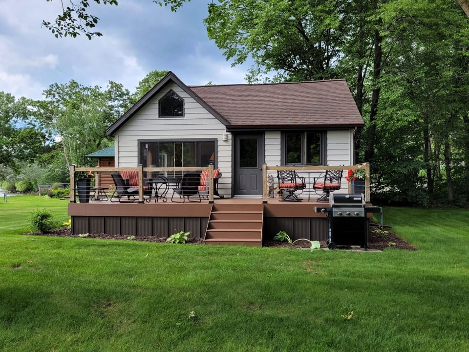 Our cozy cabin with a large deck.