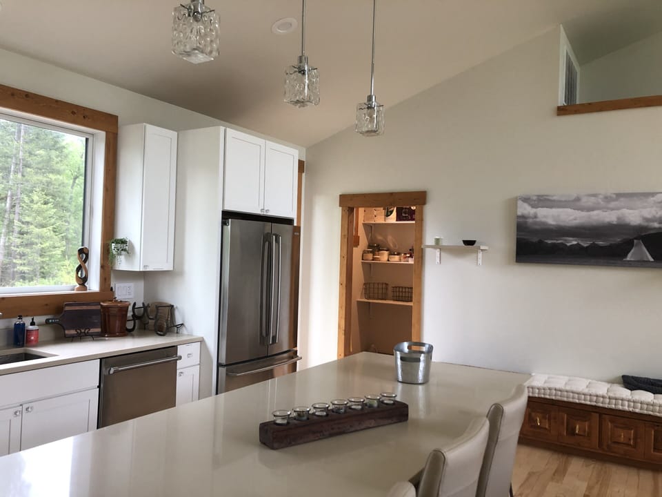 Kitchen view towards pantry 
