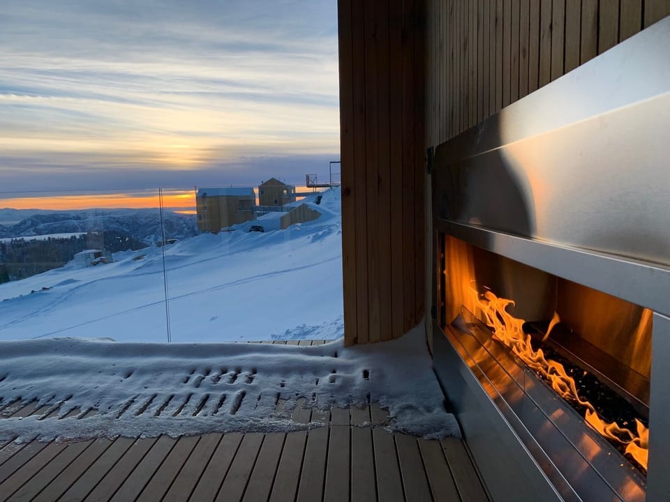 On deck, you are outdoors with spectacular views, but still warm