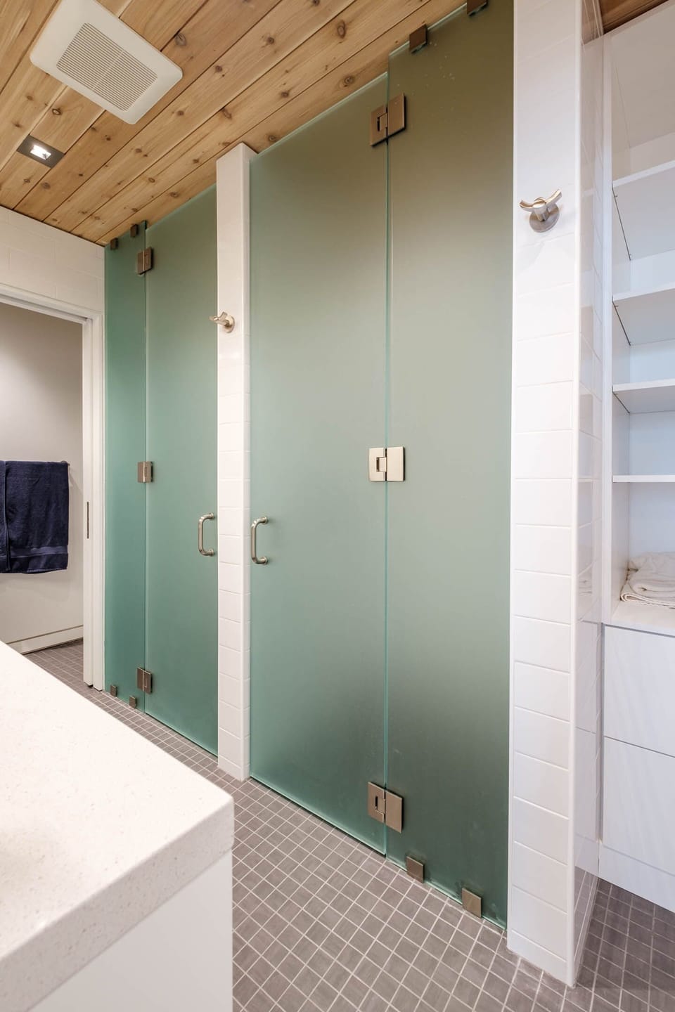 Bedrooms 3&4 share bathroom: 2 private showers, plus toilet behind sliding door