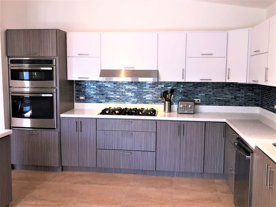 Gas cooktop and wall mounted oven/microwave.