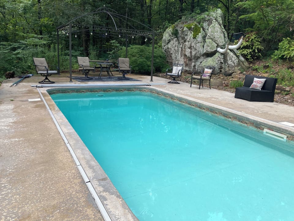 In ground swimming pool.
Located up a path behind main house.
8' deep no diving!