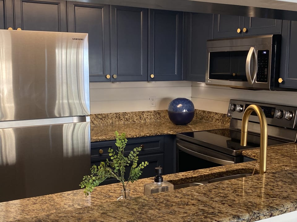 NEW kitchen updates!  The appliances are beautiful, shiplap walls and ceiling!
