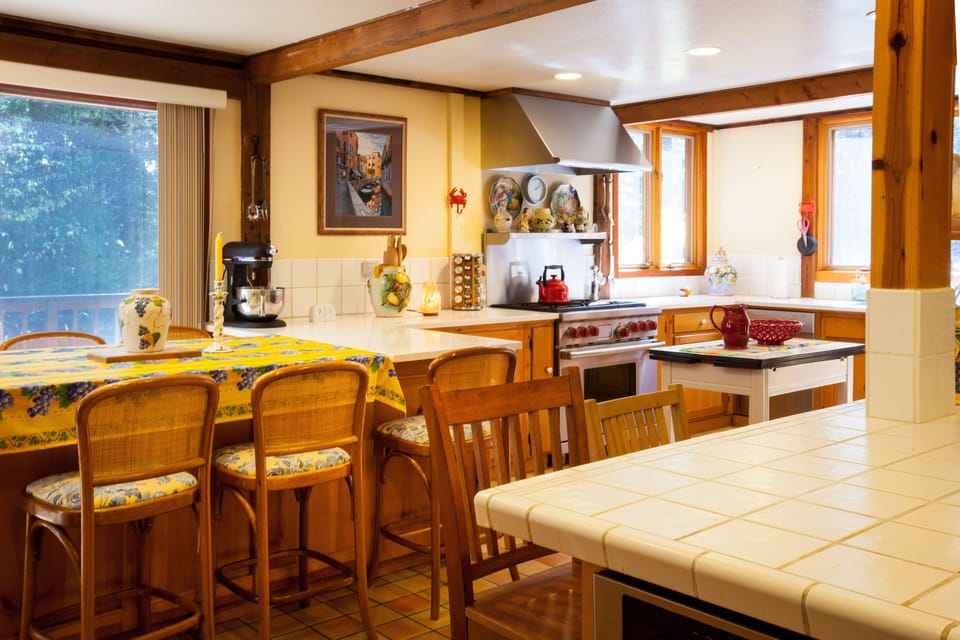 From East Deck enter HUGE KITCHEN:   6-Burner Wolf Stove/Oven, Dish Washer, Sink