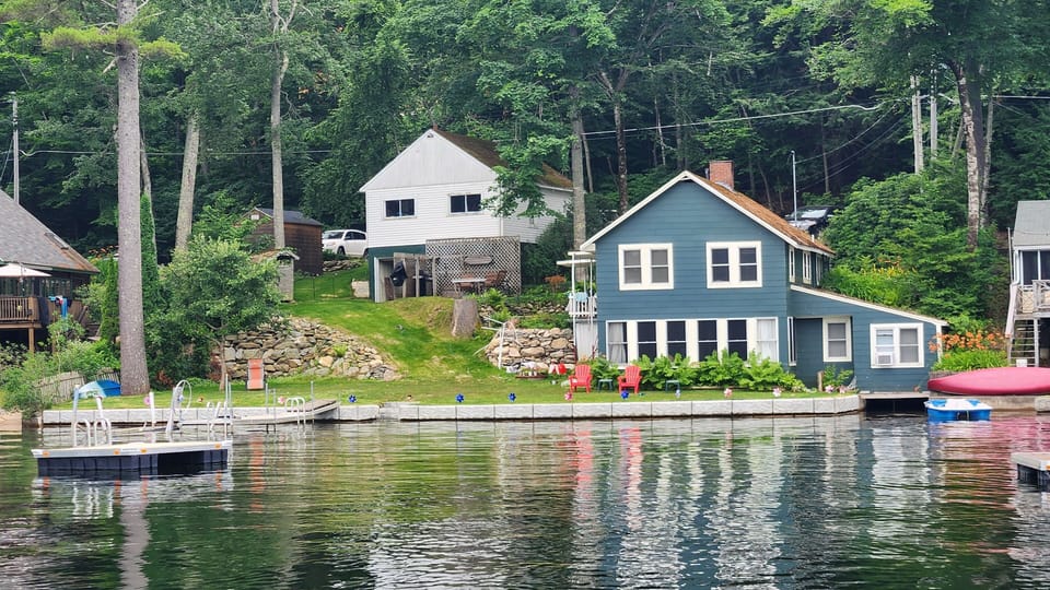 from the water (cottage on right, owner's garage up top)
