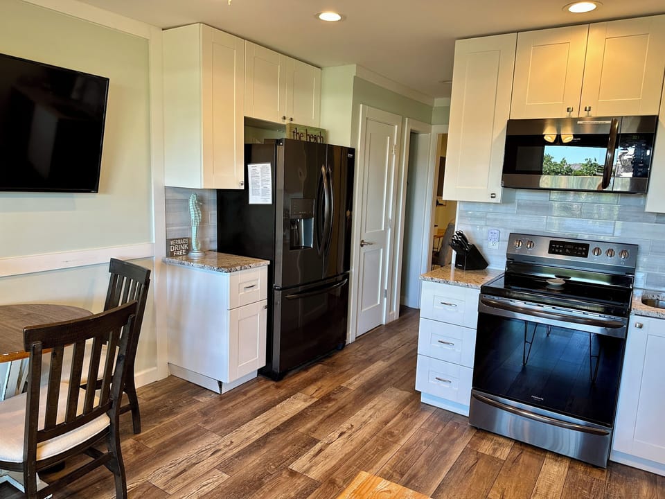Kitchen - Oversized fridge with water and ice dispenser