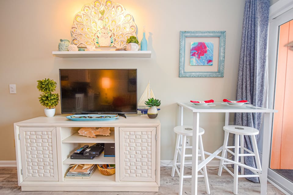 Living area TV and dinette seating 