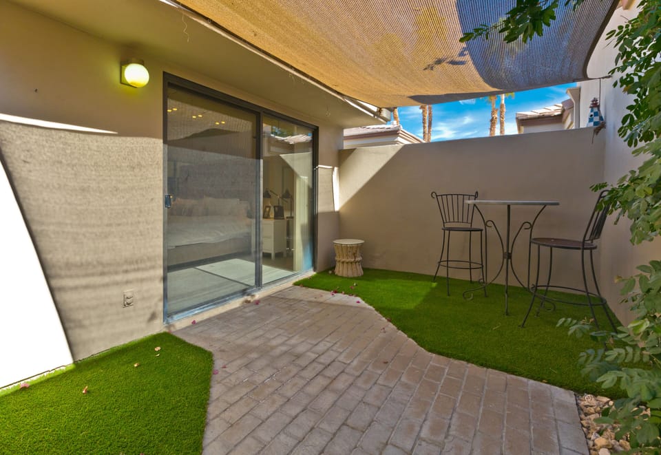 Just off the master bedroom a private courtyard to read a book or relax.  