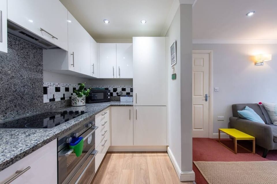 The kitchen with integrated fridge freezer.