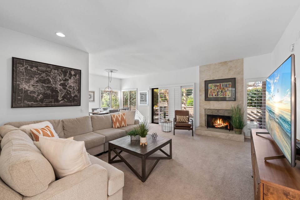 Cozy Living Room with Smart TV & Fireplace