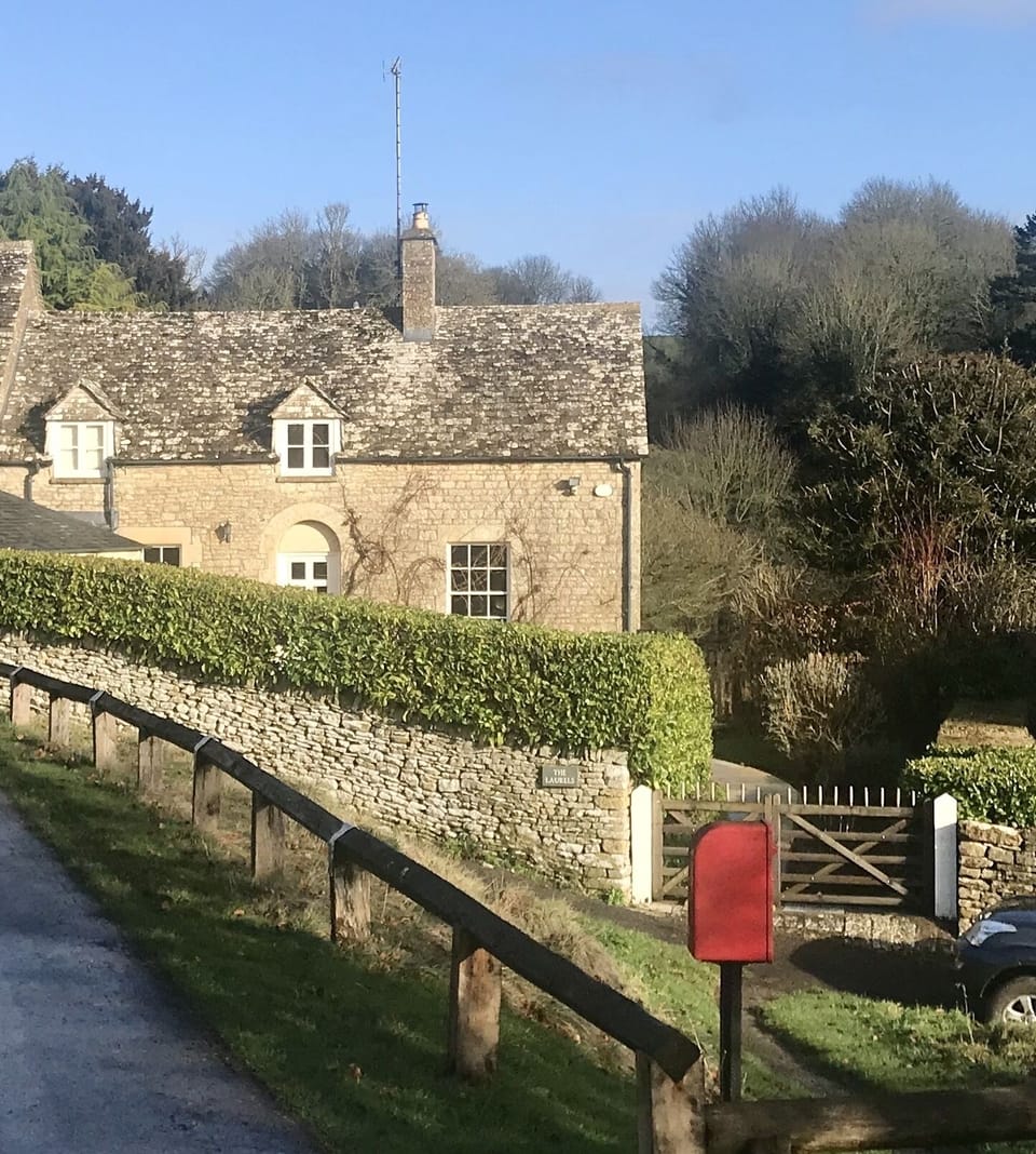 The entrance to The Old Post Office is just down a track from the church