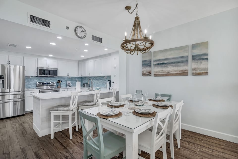 Coastal elegance meets relaxed dining in this inviting space.