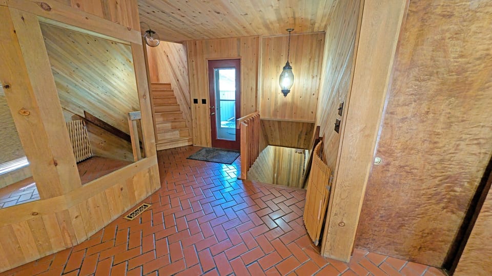 The garage enters to this Foyer