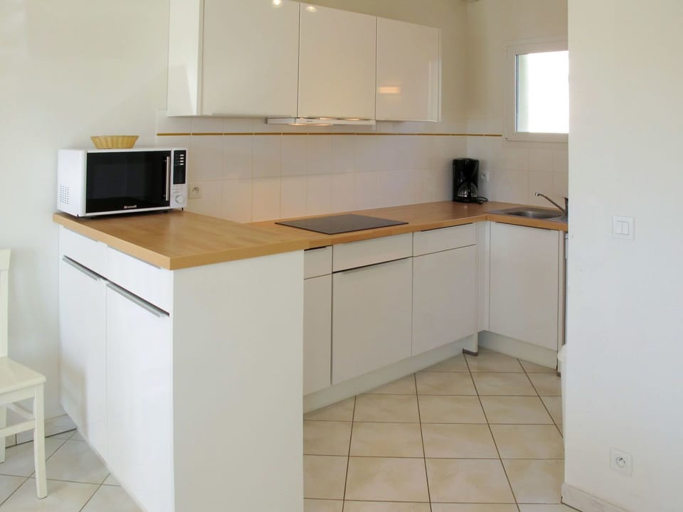 Property, Furniture, Room, Kitchen, Cabinetry, Countertop, Building, Interior Design, Floor, Material Property