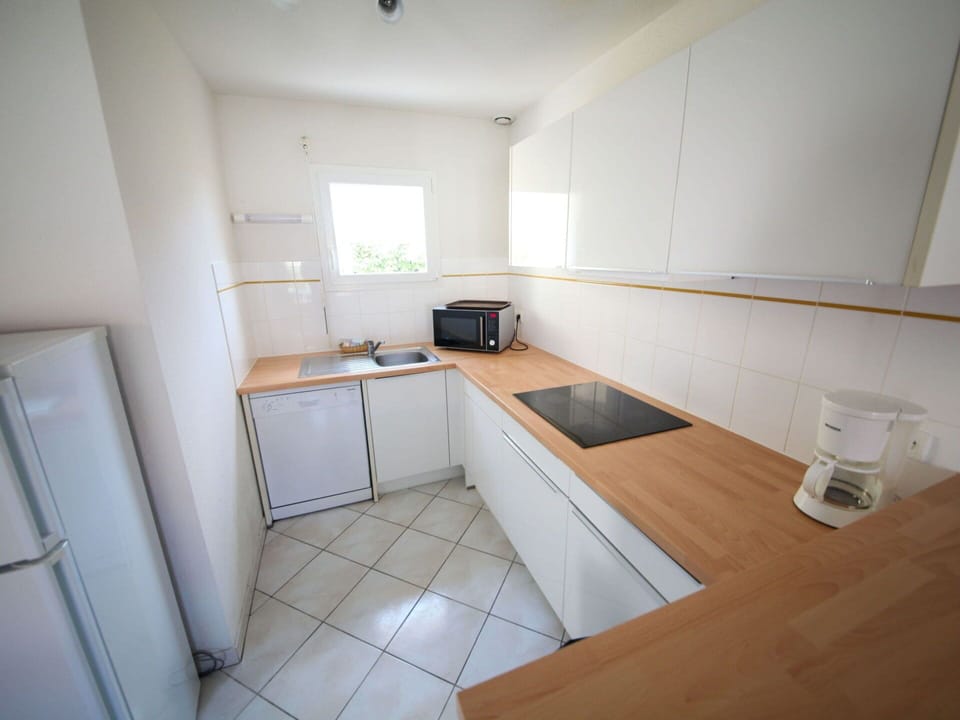 Cabinetry, Building, Table, Kitchen, Wood, Flooring, House, Floor, Home Appliance, Countertop