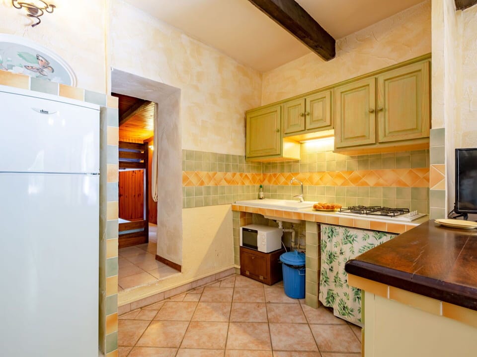 Cabinetry, Countertop, Property, Kitchen Appliance, Kitchen Stove, Kitchen, Sink, Tap, Wood, Interior Design