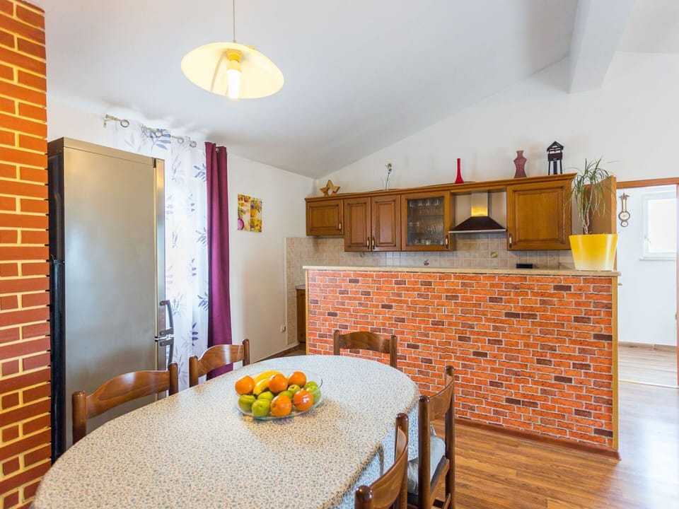 Furniture, Cabinetry, Property, Lighting, Wood, Countertop, Table, Orange, Interior Design, Flooring