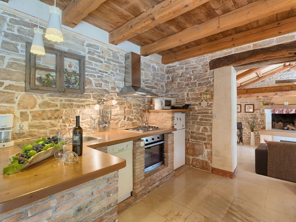 Cabinetry, Countertop, Property, Furniture, Kitchen, Tap, Wood, Interior Design, Kitchen Stove, Architecture