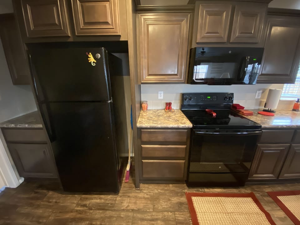 Large Kitchen so the Ladies can watch the men prepare dinner..Right ?
