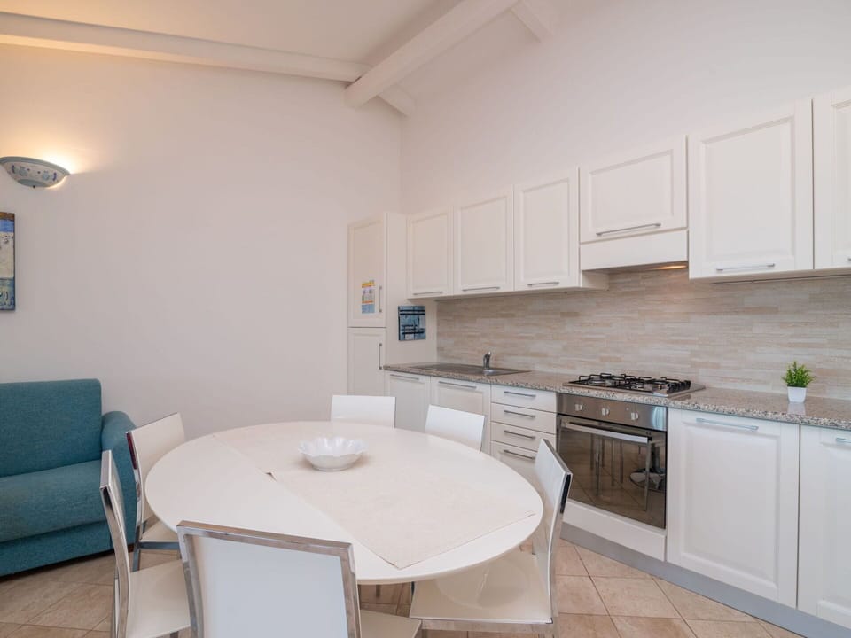 Building, Table, Cabinetry, Furniture, Countertop, Wood, Interior Design, Architecture, Flooring, Floor
