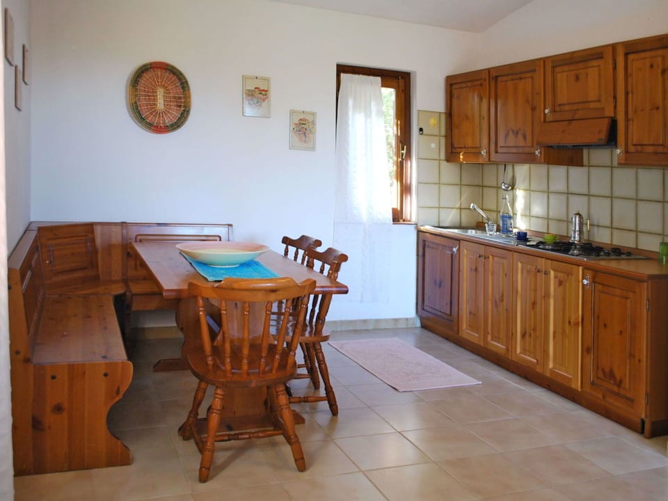 Furniture, Cabinetry, Property, Table, Wood, Building, Interior Design, Countertop, Flooring, Chair