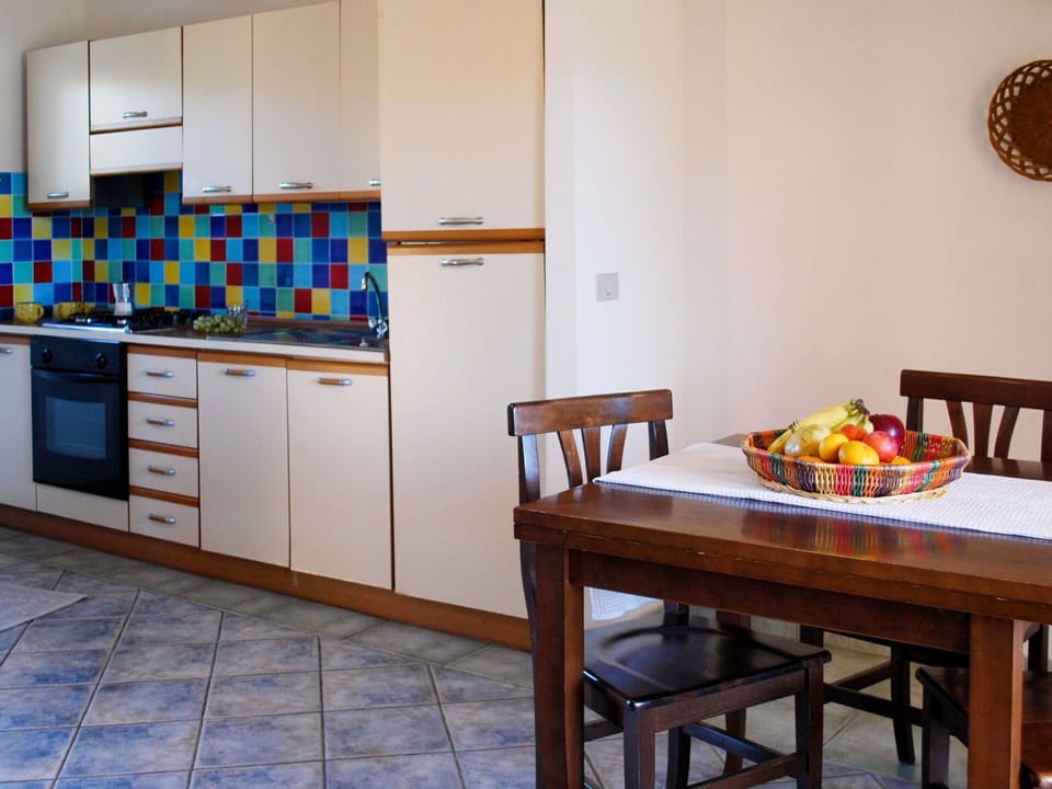 Table, Food, Property, Furniture, Tableware, Cabinetry, Chair, Interior Design, Wood, Floor