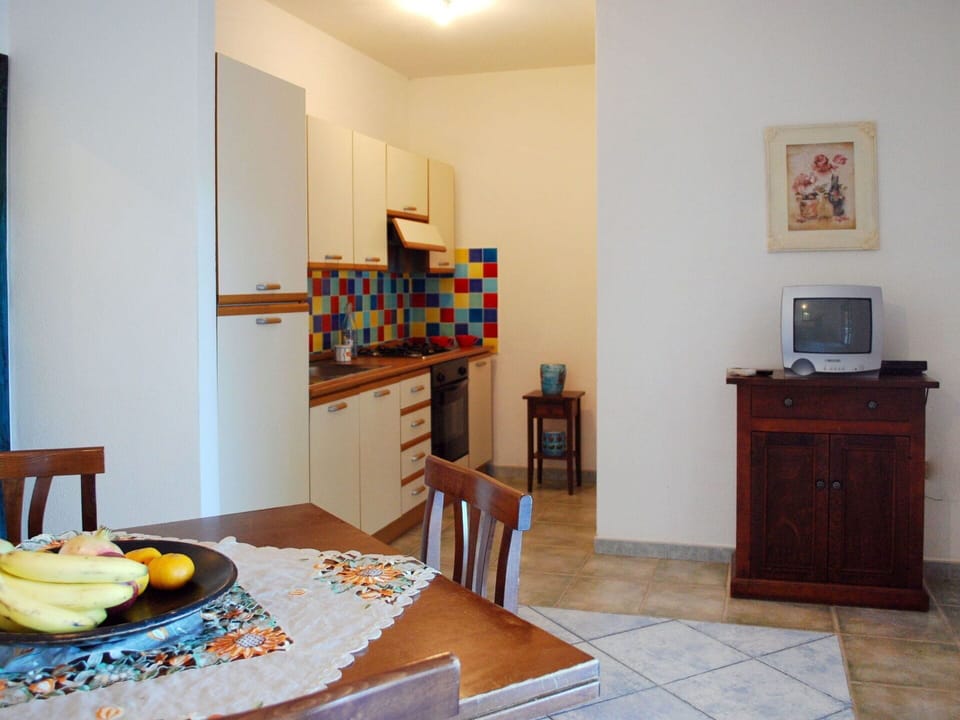 Table, Property, Furniture, Tableware, Blue, Cabinetry, Wood, Drawer, Interior Design, Chair