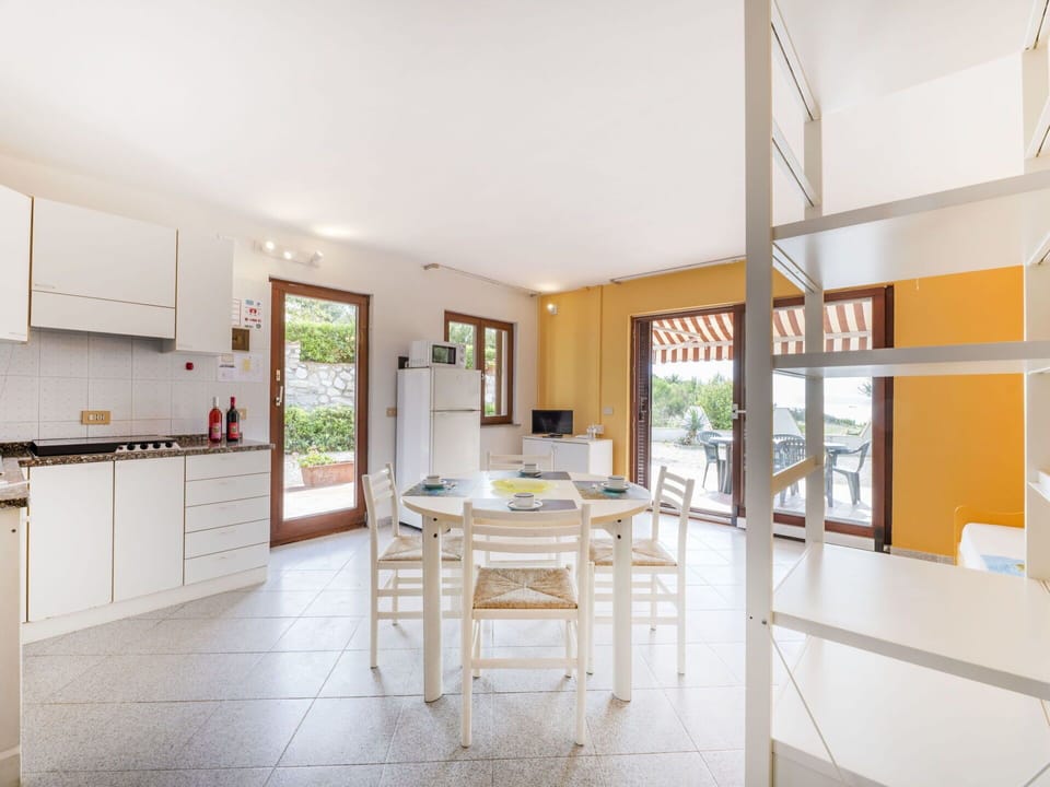 Furniture, Cabinetry, Building, Countertop, Table, Wood, Interior Design, Chair, Door, Kitchen Appliance