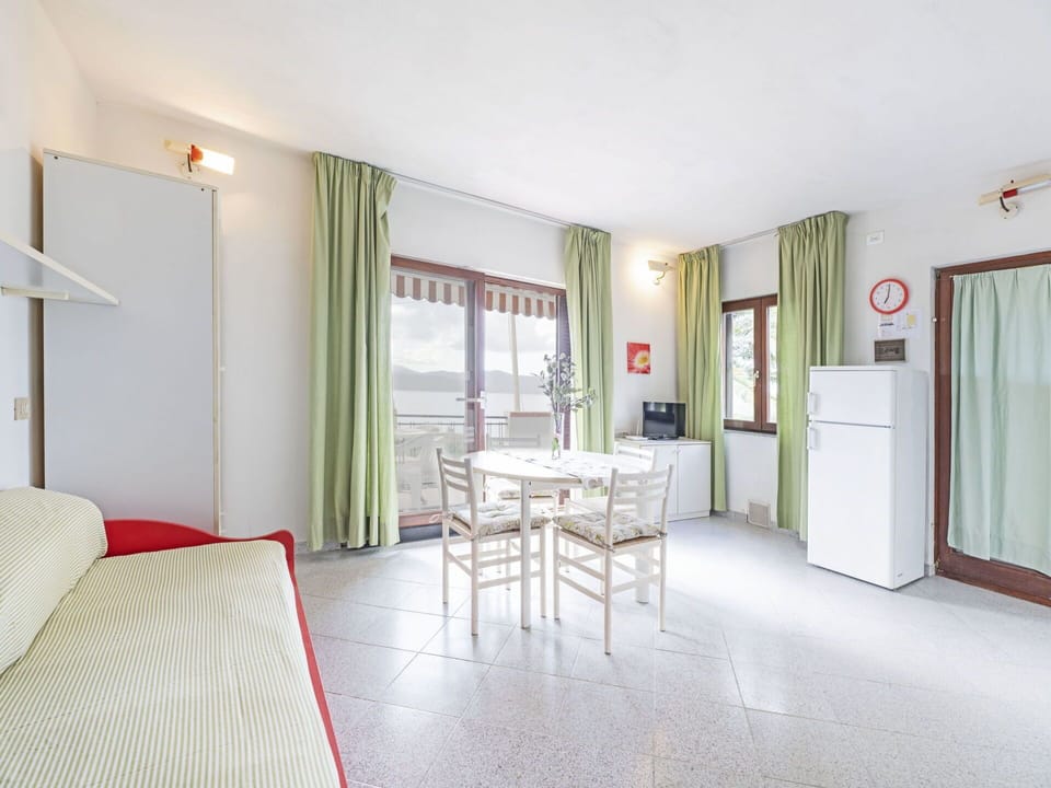 Furniture, Houseplant, Building, Door, Couch, Comfort, Plant, Flooring, Picture Frame