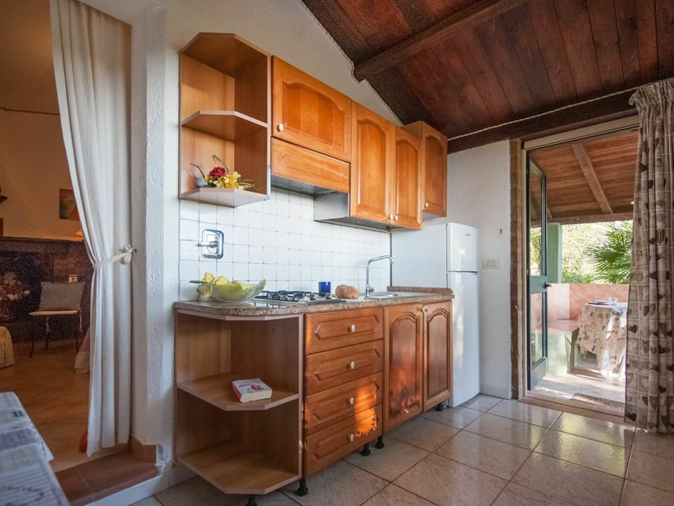 Cabinetry, Furniture, Property, Countertop, Building, Wood, Drawer, Chair, Kitchen, Interior Design