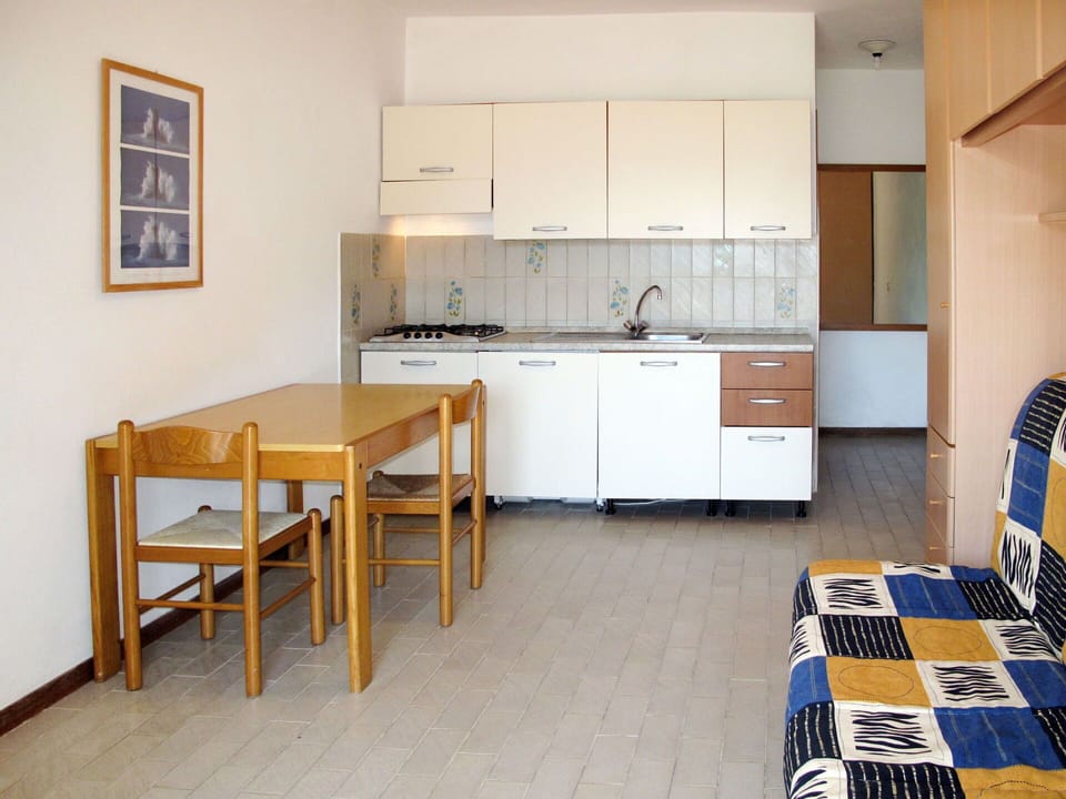 Room, Furniture, Property, Kitchen, Building, Floor, Interior Design, Yellow, Cabinetry, Countertop