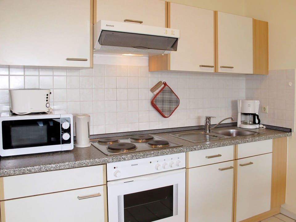 Countertop, Room, Cabinetry, Kitchen, Property, Kitchen Stove, Furniture, Major Appliance, Kitchen Appliance, Tile