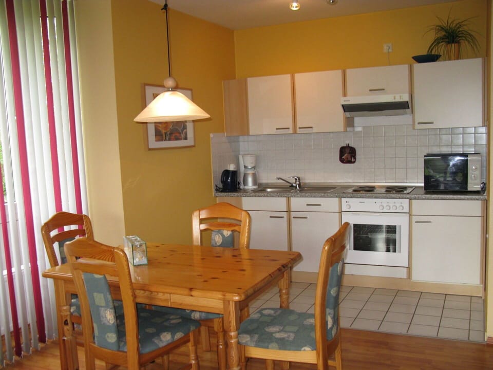 Countertop, Furniture, Property, Cabinetry, Kitchen Appliance, Chair, Wood, Kitchen Stove, Kitchen, Home Appliance