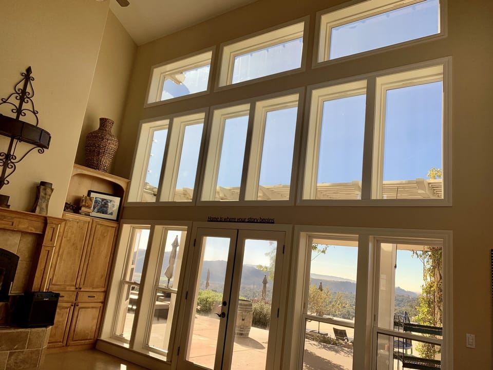 Two Story Windows with Spectacular Ocean and Valley Views