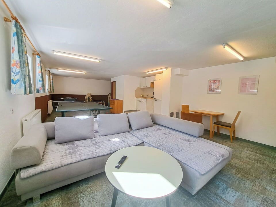 Furniture, Interior Design, Flooring, Floor, Couch, Ceiling, Room, Living Room, Lighting, Apartment