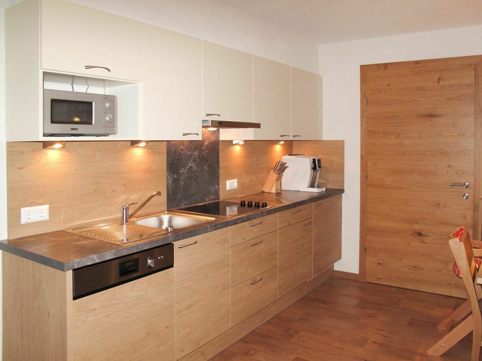 Tap, Cabinetry, Sink, Property, Kitchen Sink, Countertop, Plumbing Fixture, Kitchen Stove, Wood, Kitchen