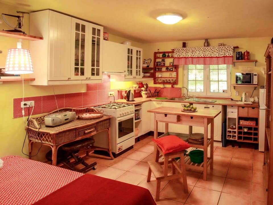 Cabinetry, Table, Property, Countertop, Furniture, Window, Kitchen, Drawer, Lighting, Interior Design