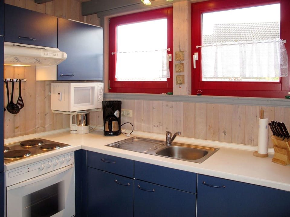 Countertop, Sink, Room, Cabinetry, Furniture, Property, Kitchen, Interior Design, Tile, Building