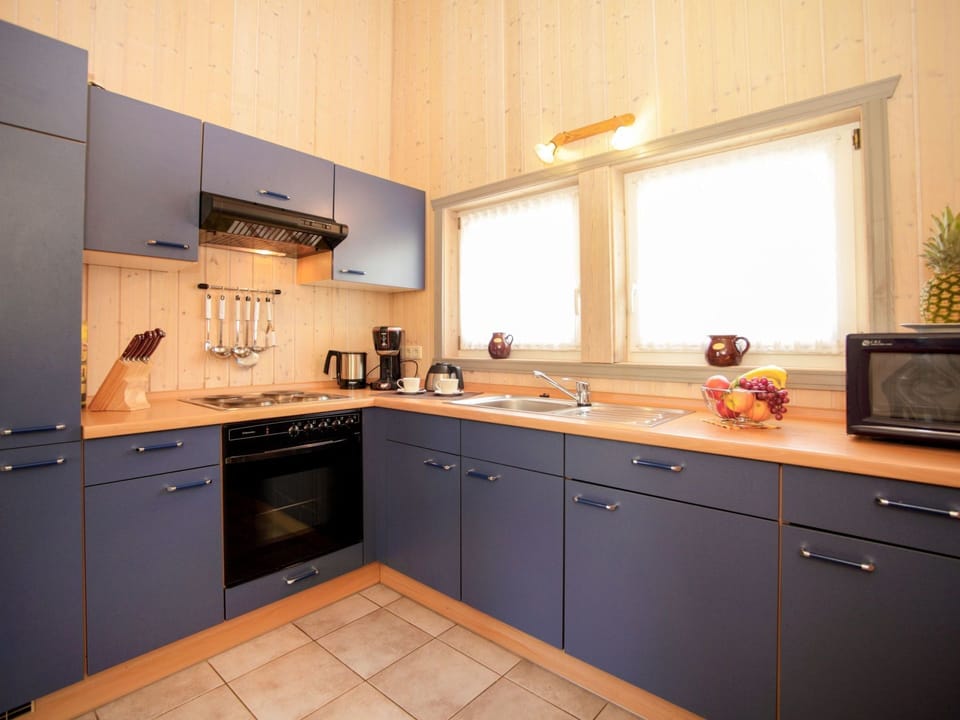 Countertop, Cabinetry, Kitchen, Room, Property, Furniture, Kitchen Stove, Interior Design, Building, House