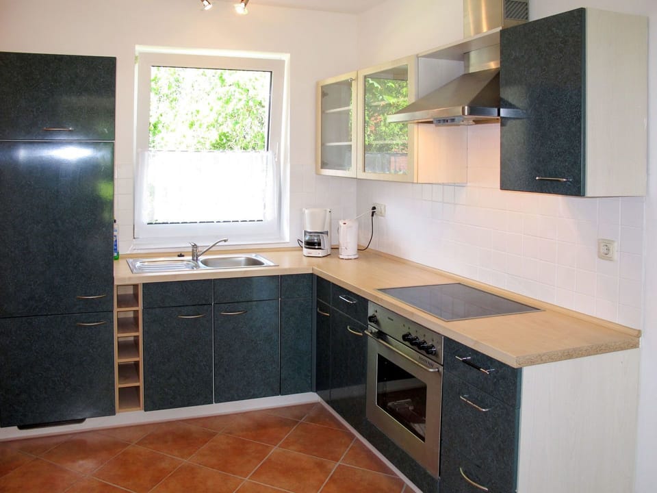 Countertop, Room, Property, Furniture, Cabinetry, Kitchen, Sink, Floor, Interior Design, Building