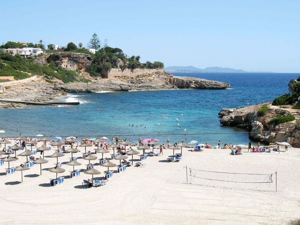Water, Sky, Daytime, Azure, Building, Coastal And Oceanic Landforms, Body Of Water, Landscape, Beach, Natural Landscape