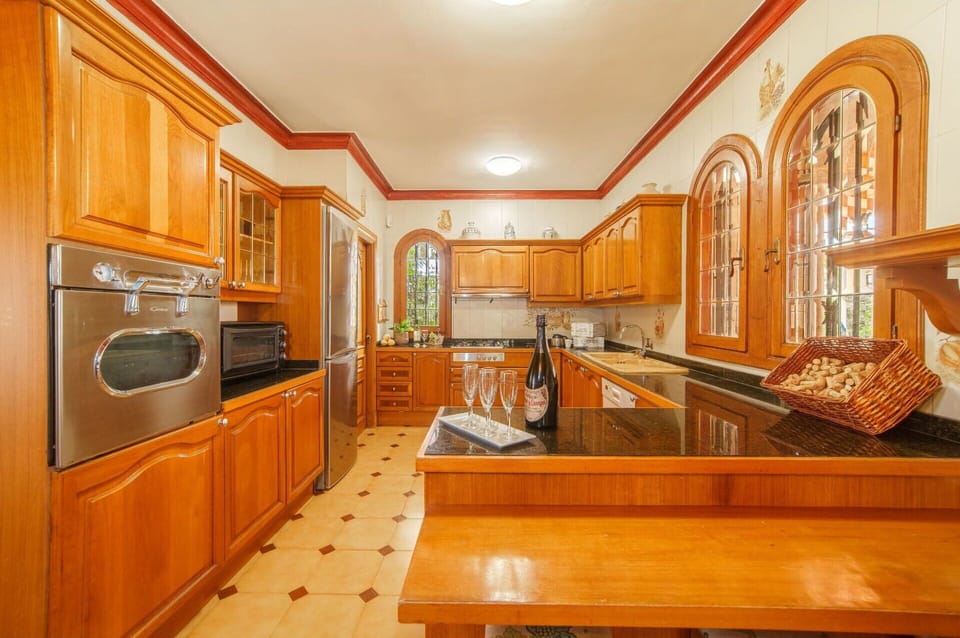 Cabinetry, Furniture, Countertop, Building, Wood, Drawer, Interior Design, Kitchen Appliance, Kitchen Stove, Home Appliance