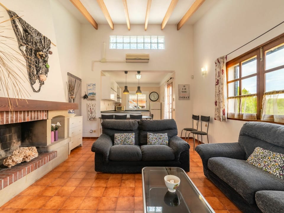 Property, Couch, Furniture, Picture Frame, Interior Design, Building, Living Room, Table, Wood, Flooring