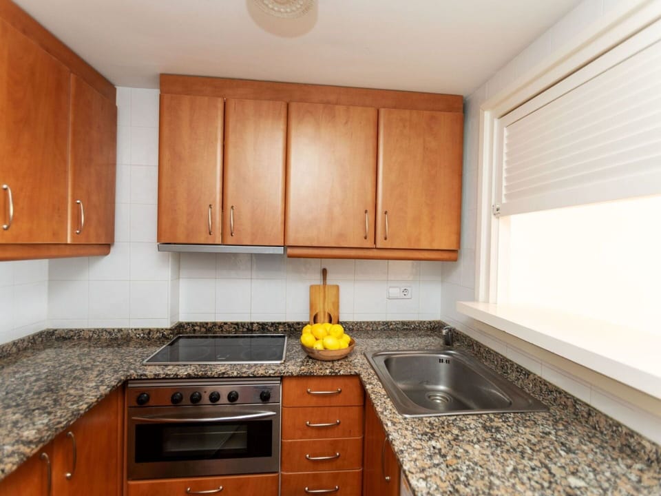 Brown, Cabinetry, Countertop, Property, Building, Kitchen Sink, Kitchen, Wood, Kitchen Stove, Wood Stain