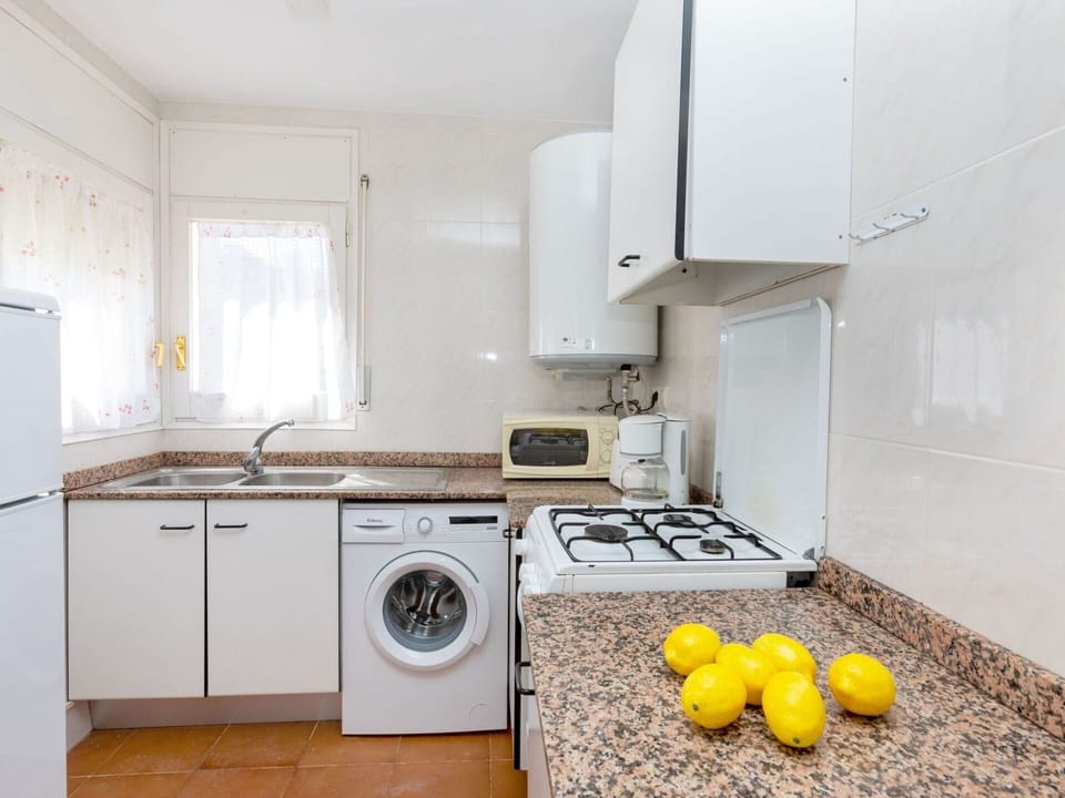 Cabinetry, Countertop, Property, Laundry Room, White, Kitchen Appliance, Kitchen, Kitchen Stove, Home Appliance, Gas Stove