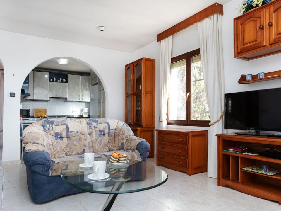 Cabinetry, Furniture, Property, Comfort, Building, Table, Wood, Interior Design, Orange, Living Room